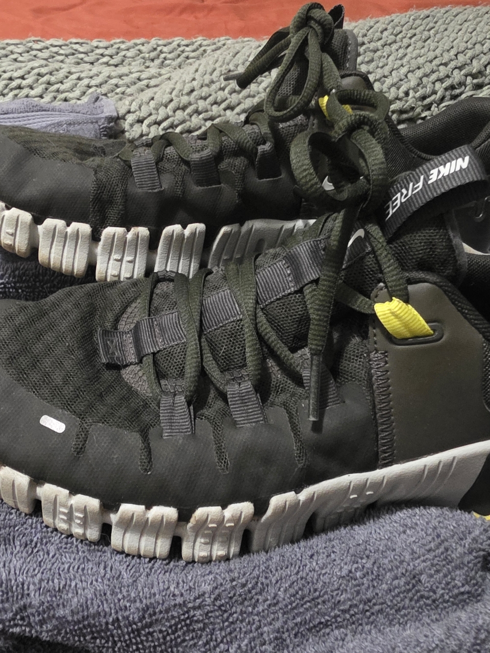 Nike Free Men’s Black Athletic Shoes with Yellow Accent